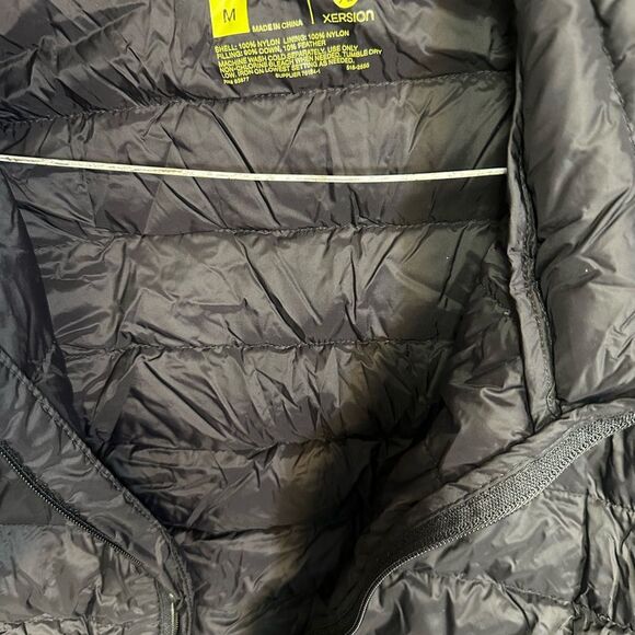 Xersion Black Duffel Bag with Green Logo with black down jacket new size medium - Picture 4 of 5